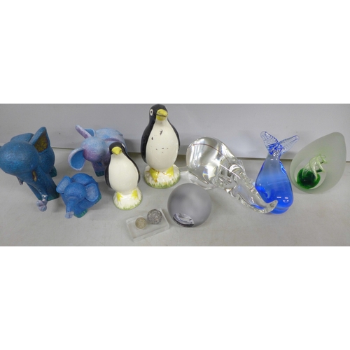 2022 - A collection of animal figures and paperweights to include a trio of elephants (one a/f), glass rhin... 