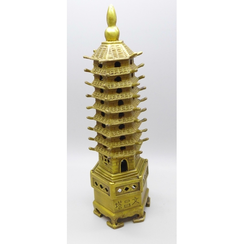 2038 - A brass model of a Wenchang pagoda, 19cm