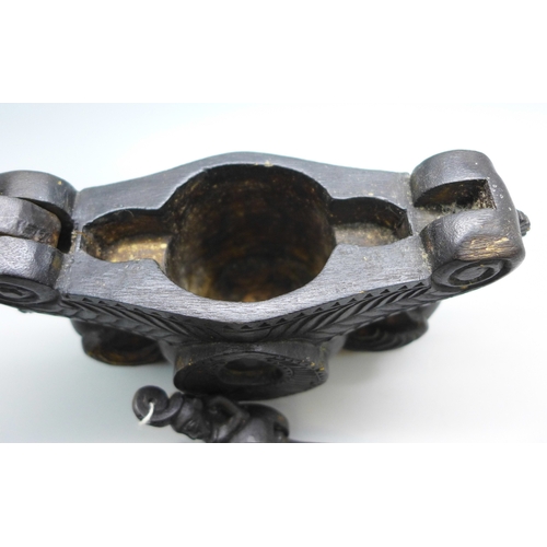 2039 - A set of Eastern opium scales housed in carved wooden box with hinged lid and bird detail, 17cm wide