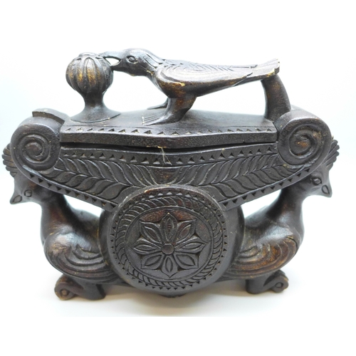 2039 - A set of Eastern opium scales housed in carved wooden box with hinged lid and bird detail, 17cm wide