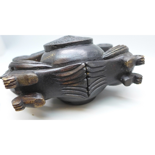 2039 - A set of Eastern opium scales housed in carved wooden box with hinged lid and bird detail, 17cm wide