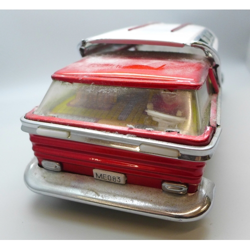 2048 - A tin-plate Mystery Action model bus, made in China, ME083