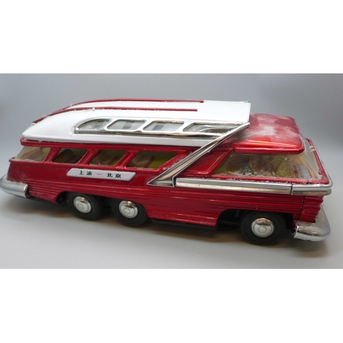 2048 - A tin-plate Mystery Action model bus, made in China, ME083