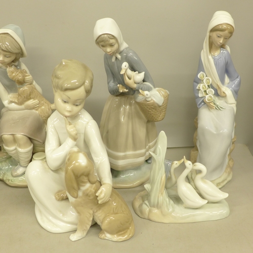 2083 - Six Lladro figures, two Nao figures of children and a Nao geese figure group, (9 in total)