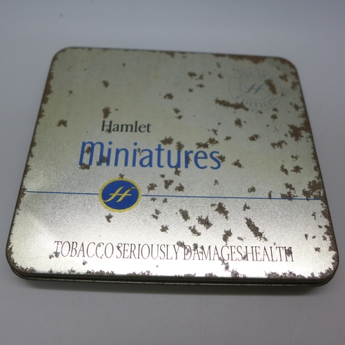 A tin of Hamlet Special Edition miniature cigars and another packet of ...