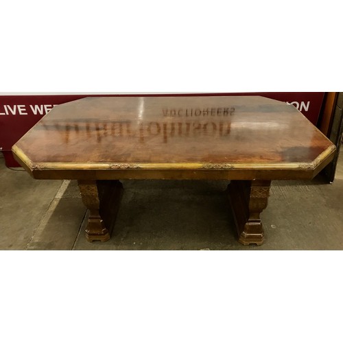 164 - An Art Deco mahogany pedestal dining table