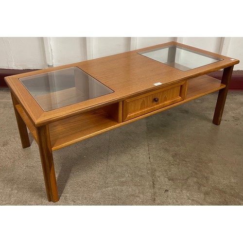 66 - A G-Plan teak and glass topped rectangular coffee table