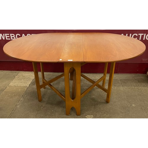 13 - A McIntosh teak drop-leaf table
