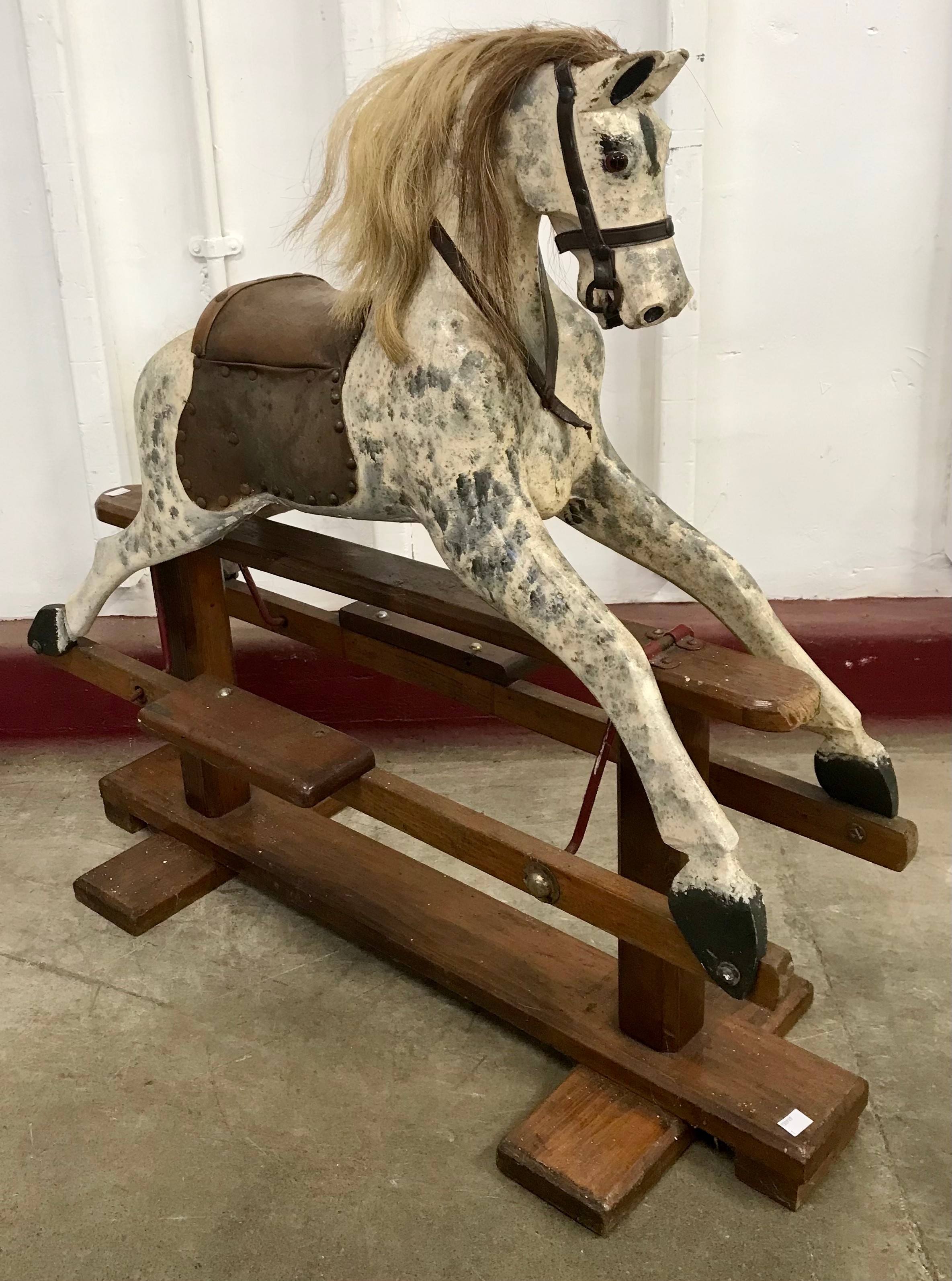 A Victorian style dapple grey painted rocking horse