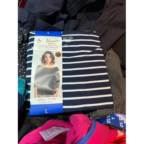 6083 - A pallet of mixed clothing to include trousers, shirts, jeans, hoodies, etc. Various brand styles an... 