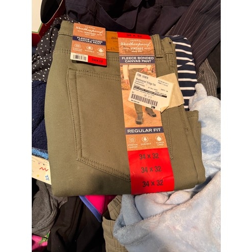 6083 - A pallet of mixed clothing to include trousers, shirts, jeans, hoodies, etc. Various brand styles an... 