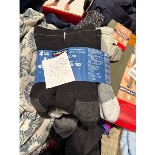 6083 - A pallet of mixed clothing to include trousers, shirts, jeans, hoodies, etc. Various brand styles an... 