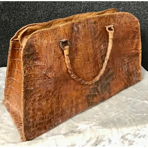 254 - A c.1970's crocodile skin bag