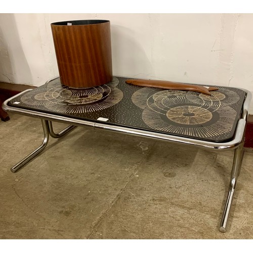 62 - An Italian style chrome rectangular coffee table, teak wastepaper bin and a teak wall hanging model ... 