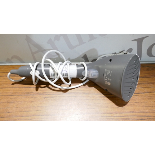 6069 - A Philips handheld steamer and an Airia Living memory foam travel pillow  (378-90,304) *This lot is ... 