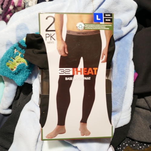 6083 - A pallet of mixed clothing to include trousers, shirts, jeans, hoodies, etc. Various brand styles an... 