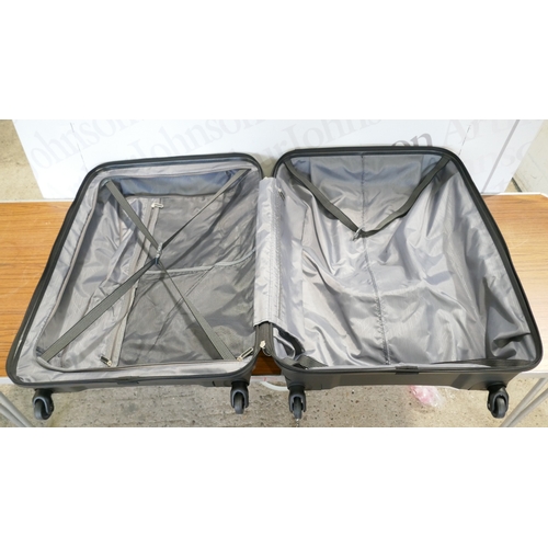 6098 - An American Tourister Jetdriver hardside suitcase,  (378-91) *This lot is subject to VAT