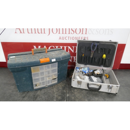 Two tool boxes of assorted Locksmith tools