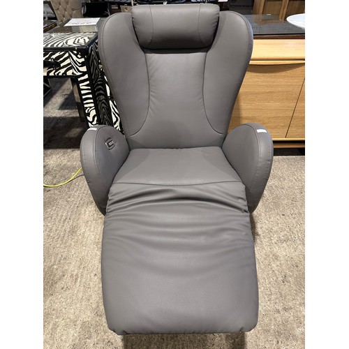 3003 - A dark grey leather electric reclining swivel chair