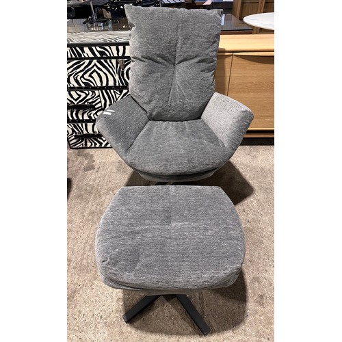 3012 - A grey fabric swivel/rocking chair with footstool