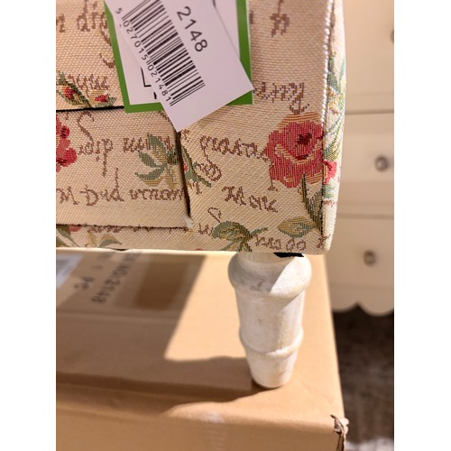 3019 - A small floral patterned footstool with a drawer (unchecked)