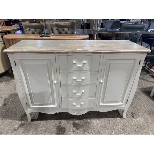 3035 - A white two door 4 drawer sideboard with contrast top