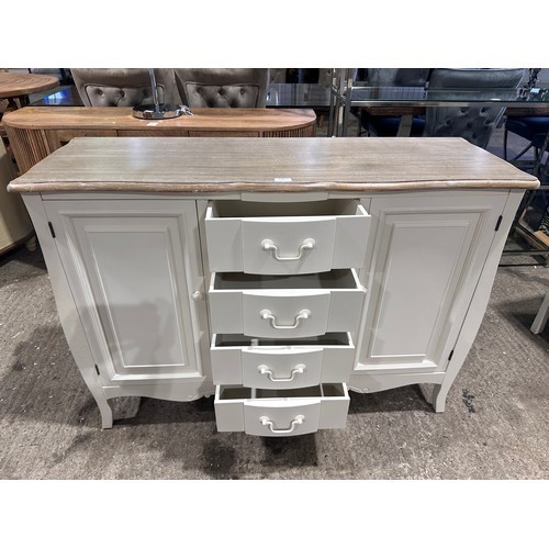 3035 - A white two door 4 drawer sideboard with contrast top