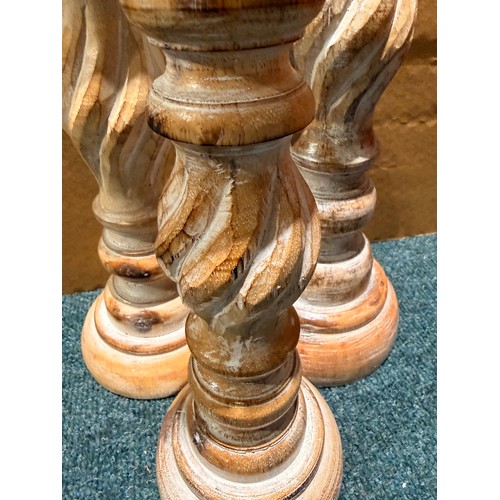3038 - A set of three candlestick holders