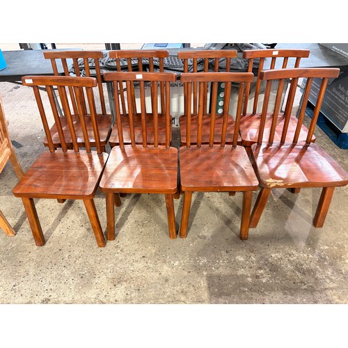 3042 - A set of eight hardwood dining chairs (marked)