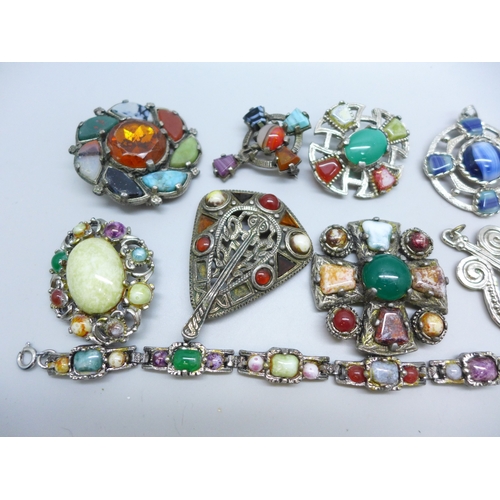 7168 - Eight Celtic style pendants, four brooches, and a bracelet