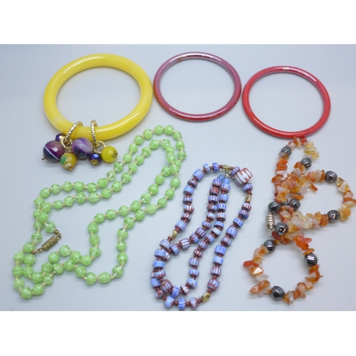 7173 - A collection of glass necklaces and bracelets