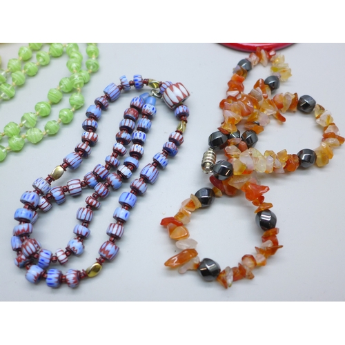 7173 - A collection of glass necklaces and bracelets