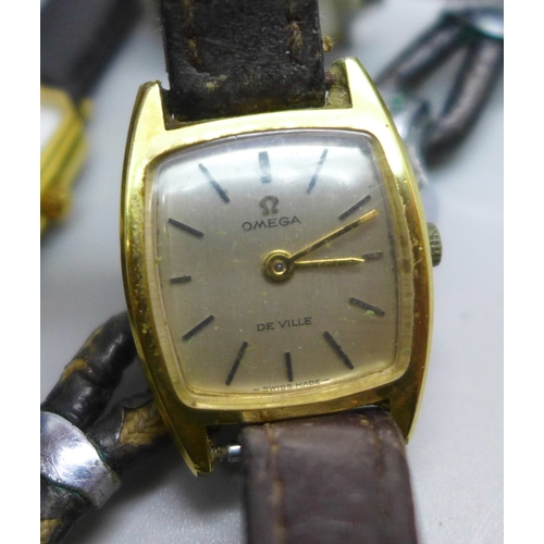 7179 - A lady's Raymond Weil gold plated wristwatch, a lady's Omega wristwatch, and other watches including... 