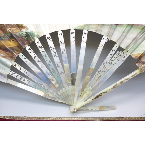 2017 - A mother of pearl fan with classic scenes, cased, a/f