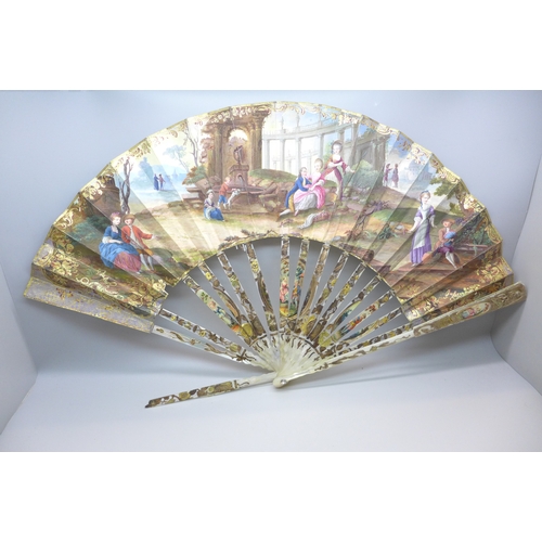 2017 - A mother of pearl fan with classic scenes, cased, a/f