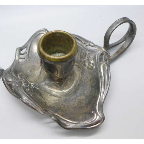 2018 - An Arts and Crafts candlestick and a similar chamberstick marked WMF, candlestick 22cm