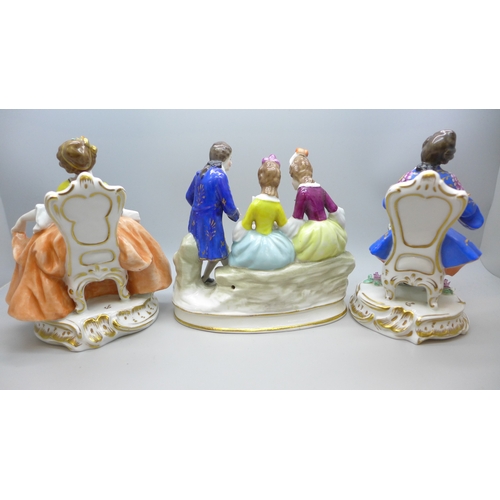 2022 - A pair of figures, seated lady and gentleman with gold anchor marks and one other continental figure... 