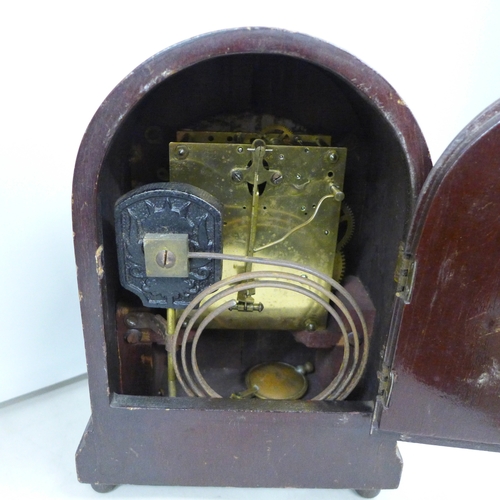 2031 - A German beehive 8-day mantel clock with striking movement and bevelled glass front, marked Tempus F... 