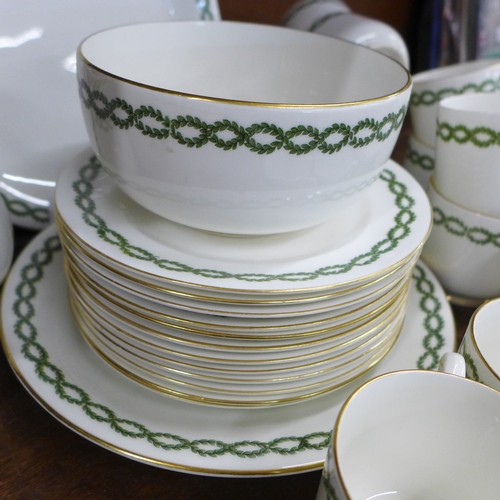 2055 - A George Jones and Sons 'Crescent' tea service with green ivy banded decoration, 10x tea cups, 12x s... 