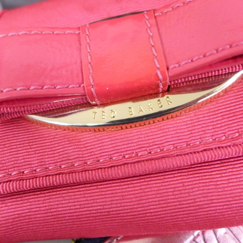 2137 - A Michael Kors handbag, a/f, lining requires cleaning, a Ted Baker handbag, a Ted Baker wallet and a... 