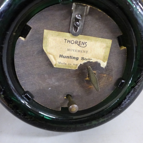 2141 - A Thorens musical glass bottle, together with a Hennessy Pull Up cigarette holder in the shape of a ... 