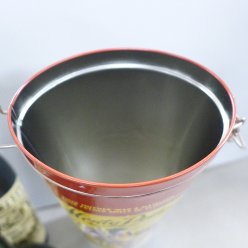 2141 - A Thorens musical glass bottle, together with a Hennessy Pull Up cigarette holder in the shape of a ... 