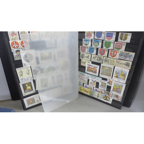 2143 - A collection of stamps in three albums, some British stamps dating back to 1930s onwards, British st... 