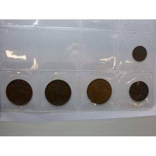 2183 - An album containing British and some American coins