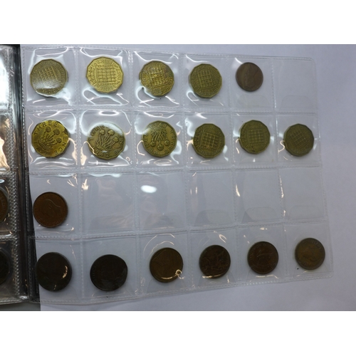 2183 - An album containing British and some American coins
