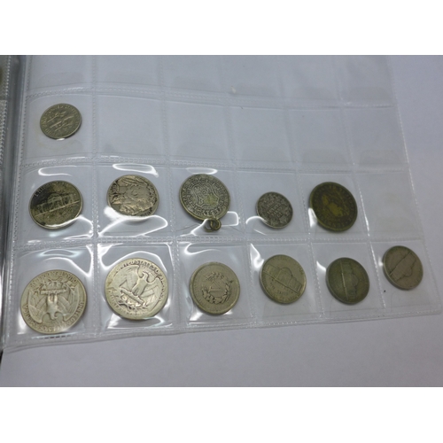 2183 - An album containing British and some American coins