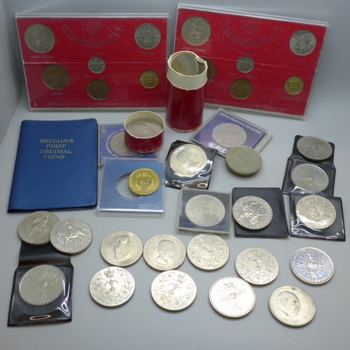 2184 - A collection of commemorative crowns, two coin sets and a Britain's first decimal coin set