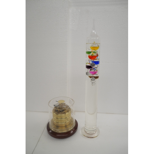 2204 - A Barigo weather station together with a Galileo thermometer