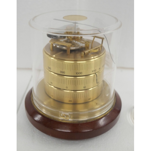 2204 - A Barigo weather station together with a Galileo thermometer