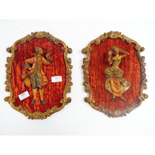 2222 - A pair of Italian decorative plaques, a lady and a gentleman, height 33cm